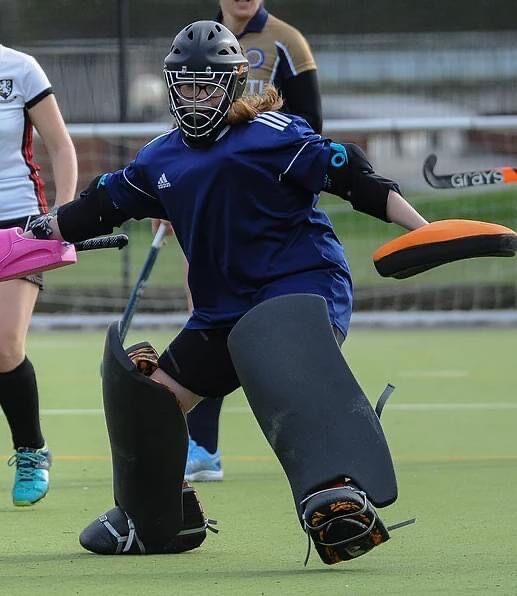 Mia in goal for her hockey team