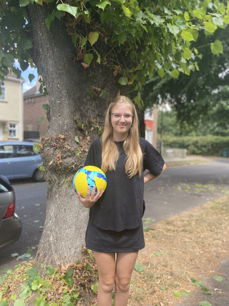 Victoria, our first grant recipient, with her volleyball